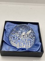 Clear glass diamond pattern paperweight inside original black box with blue satin lining