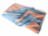 Folded view showing both pink and blue sides with satin trim and brand label.