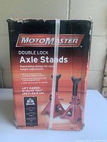 Front of the box showing Motomaster brand and details of axle stands capacity and type.