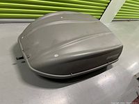 Closed top view showing grey ribbed shell and overall condition.