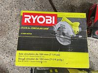 Ryobi circular saw box with 7-1/4 inch blade and 13 amp motor specs.