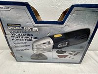 Photo of original product packaging showing Chicago Electric Professional variable speed oscillating multifunction power tool with features and usage images