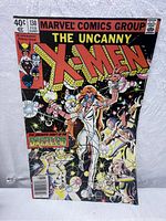 Front cover of The Uncanny X-Men #130 comic showing Marvel Comics Group header, the X-Men logo, Dazzler in white costume with shining light effects, and other X-Men characters.