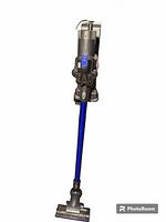 Assembled vacuum upright with wand and floor head