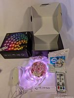 Govee LED strip light set new in box, LED strip coiled with controller, remote, and accessories