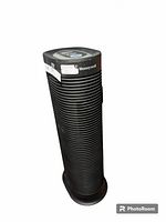 Full front view of the Honeywell tower air purifier showing its vertical cylindrical body and Honeywell branding at the top.