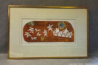 Framed First Nation art painting overall view showing the figures and composition, mounted in a gold frame.