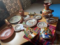Full view of 16-piece Mexican style decor set including pottery, masks, and table runner