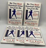 Photo showing six copies of the book titled 'Be The Best Baseball Hitter You Can Be' by Mike Eden arranged in two rows.