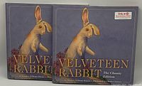 Front cover of two identical hardcover copies of "The Velveteen Rabbit Textile Edition" showing detailed rabbit illustration and Target exclusive sticker.