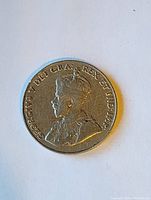 Obverse photo showing King George V portrait and inscription