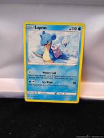 Front of the Lapras Pokémon card showing the artwork, stats, and text.