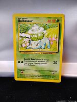 Front side of the Bulbasaur card showing character artwork, HP, attacks, and flavor text.