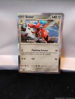 Front view of Scizor holo foil Pokemon card showing artwork, stats, and attacks