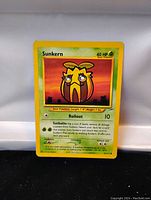 Front side of the Sunkern Pokémon card showing the character, moves, and stats.
