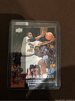 Front side of a James Harden rookie card showing him in white Arizona State basketball uniform jumping for a shot with NBA Rookie Card and Star Rookies logos.