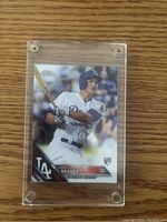 Front of the baseball card showing Corey Seager batting in Los Angeles Dodgers uniform with Topps Chrome rookie card design