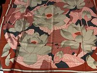 Overall shawl spread flat showing lotus pattern and border