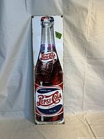 Full view of the porcelain sign showing the entire vintage Pepsi Cola bottle graphic with bottle cap and classic Pepsi branding.