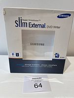 Front of the Samsung Slim External DVD Writer box showing product name and compatibility with Mac and Windows.