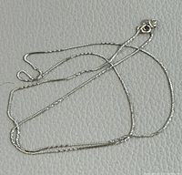 Chain laid flat showing overall length and general condition