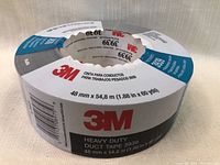 Top angle showing the 3M logo and tape dimensions of 48mm x 54.8m (1.88 in x 60 yds) and product number 3939 on label.