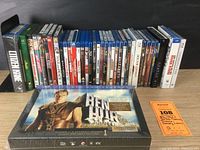 Photo showing full lot of Blu Ray and DVD movies including Ben Hur, Citizen Kane, Amélie, and others.