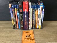 Photo showing a lineup of concert, comedy, and musical DVDs and Blu-rays, including Elvis Presley, Elton John, Nirvana, The Who, Bob Newhart, Monty Python, and others.