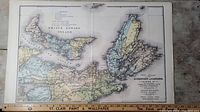 Full view of the antique map page showing Prince Edward Island, Nova Scotia, New Brunswick, and parts of mainland Canada with color-coded regions and detailed place names