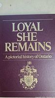 Image of book cover showing maroon background with gold embossed title 'Loyal She Remains A pictorial history of Ontario' and an emblem below.