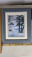 Full view of framed 'Winter Forest' painting showing the frame and surrounding matting