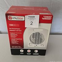 Front of the original box showing brand, model, and key product features.