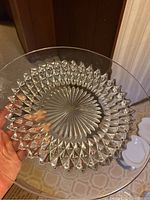 Top-down view of the crystal platter showing the starburst and diamond pattern.