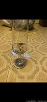 Single tall champagne flute with 22K gold rim and 1988 Calgary Winter Olympics emblem