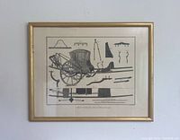 Overall photo of the framed lithograph featuring black and white illustration of antique carriage and parts, gold-tone frame.