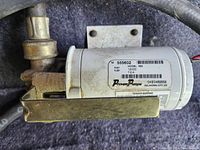 Close-up photo of the Proven Pumps 12 Volt Pony Pump showing model and electrical specifications on label.