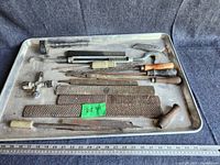 Metal tray containing assorted large vintage rasps, files, and scribes arranged with a green Lot 34 tag. A ruler shows items are around 12 inches or longer.