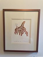 Framed copper art print titled 'Haida Killer Whale' showing full artwork and frame.