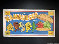 Original game box with colorful illustrations of hamburger ingredients and title text
