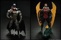 Two 1995 Batman Forever action figures: Sonar Sensor Batman and Hydro Claw Robin, posed standing on a dark surface.