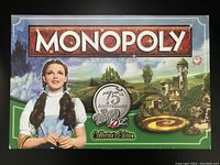 Game box front showing artwork of Dorothy and Wizard of Oz theme with 75th Anniversary logo.