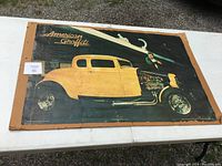 Full view of the vintage American Graffiti poster showing entire artwork with some edge damage and creases.