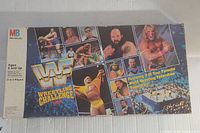 Game box cover featuring WWF wrestlers graphics and boxing title.