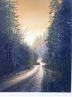 Close-up of the hand-colored black and white mountain road photograph with visible fine tinting details on trees and sky.