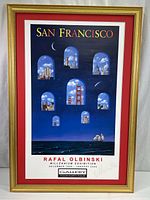 Full view of signed Rafal Olbinski San Francisco gallery poster in gold painted wood frame, no glass.