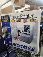 Front of box showing model HL-5040 branding, speed and resolution specs