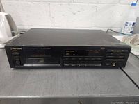 Full view of the Pioneer PD-M455 device on a table, showing front panel and control buttons.