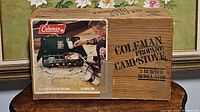 Photo of original packaging box for Coleman propane campstove model 5400 showing product image and branding.