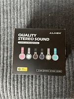 Front box of Ailihen C8 Wired Headphones showing branding, stereo sound claim, and color options