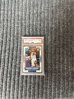Front view of Andrew Wiggins 2014 Panini Donruss rookie card graded PSA 9 displayed in protective plastic case.